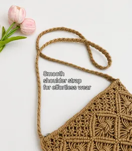 Detailed handmade woven shoulder bag with diamond mesh patterns and cotton rope tassels
