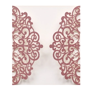 Detailed laser-cut vine patterns on pink glitter wedding invitation card covers
