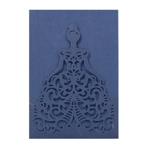 Detail of laser cut dark blue invitation with elegant female silhouette and lace pattern