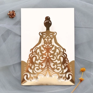 Detailed laser-cut gold wedding invitation featuring elegant hollow-out girl design