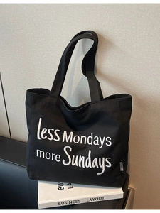 Black canvas tote bag with 'less Mondays more Sundays' print for daily commuting