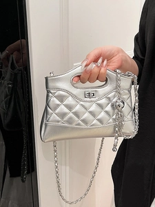 Chic silver quilted shoulder bag with metal turn-lock and chain handle for women
