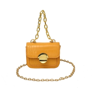 Orange faux leather shoulder bag for girls with crocodile texture and gold chain strap