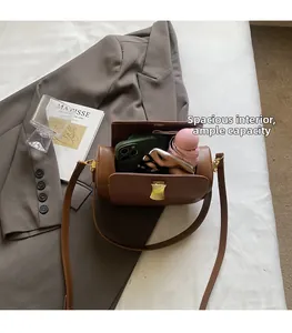Detailed view of the brown leather boston bag interior showing high storage capacity