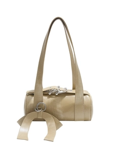 Minimalist beige Boston pillow bag with silver metal rings and large capacity design