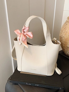 Vintage beige lychee pattern bucket bag with decorative pink heart silk scarf
