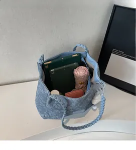 Internal view showing large capacity for tablet and items in floral denim tote bag