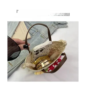 Internal view showing storage capacity of flower woven bag with cosmetics and phone