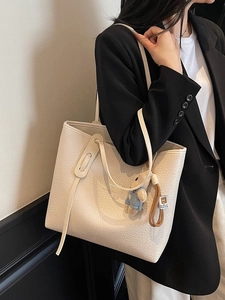 Off-white large capacity tote bag with bear charm pendant and grainy leather texture