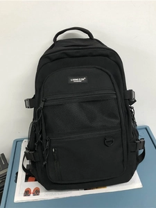 Sac à dos noir de grande capacité avec plusieurs compartiments et poches filet