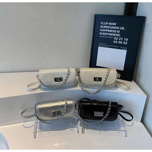 Detailed display of quilted chain mini bags in white, beige, silver, and black colors