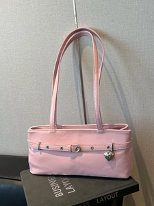 Pink minimalist faux leather shoulder bag with chic silver heart charm and long straps
