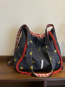 Casual large capacity denim shoulder bag with floral embroidery and drawstring