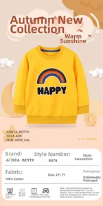 Detail of 100% cotton kids sweatshirt featuring colorful rainbow embroidery and happy text