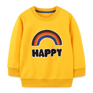 Kids yellow crewneck sweatshirt featuring rainbow patch and HAPPY embroidery