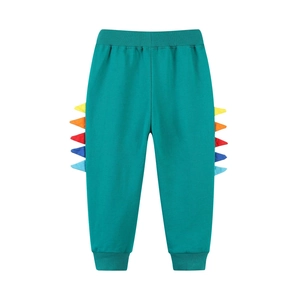 Kids dinosaur themed sports trousers in dark teal with colorful 3D back spine detail