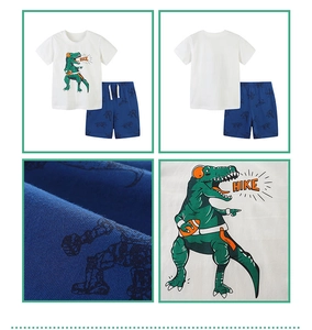 Detailed views of cotton kids sport set with dinosaur print T-shirt and drawstring shorts