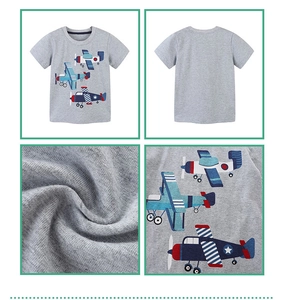 Close-up of grey cotton fabric texture and cartoon airplane print on kids t-shirt