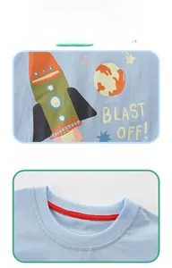 Detailed view of the boys' blue cotton t-shirt with rocket print and reinforced neckline