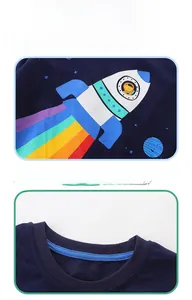 Close-up of boys' navy blue cotton T-shirt featuring rocket and rainbow prints