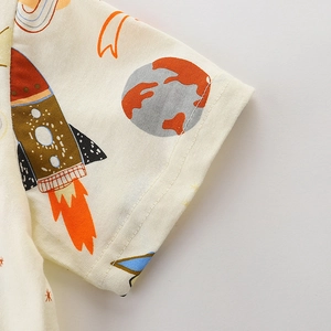 Sleeve detail of boys short sleeve cotton t-shirt featuring space rocket cartoon prints