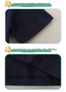 Détail d'un T-shirt garçon bleu marine montrant les coutures et ourlets renforcés