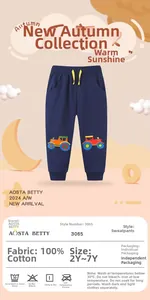 Detail of navy boy's sweatpants with yellow drawstring and tractor embroidery
