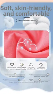Close-up of 100% combed cotton pink knit fabric showing soft texture and fine weave