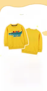 Detail of bright yellow boys' sweatshirt with 3D crocodile embroidery and ribbed cuffs