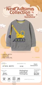 Detail view of cotton kids grey sweatshirt featuring yellow excavator and cartoon cat prints