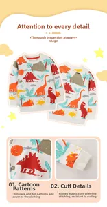 Détails de l'imprimé dinosaure coloré et des poignets côtelés sur le sweat beige enfant