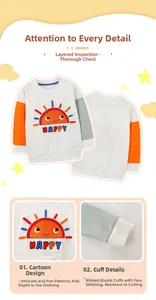 Detail of happy sun embroidery and contrast orange patchwork sleeve on kids sweatshirt