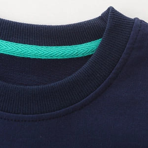 Boys navy blue crewneck sweatshirt with ribbed collar and green interior neck tape
