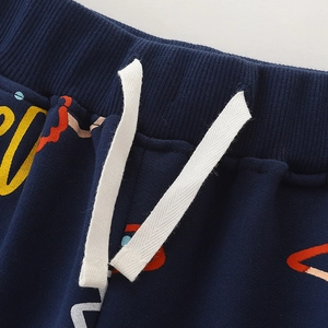 Boys navy joggers with elastic waist, drawstring, and colorful graffiti letter print