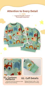 Detail view of mint green kids sweatshirt with farm animals and tractor print patterns