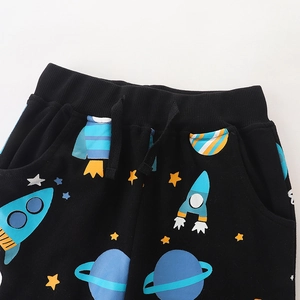 Boys' black casual pants featuring space cartoon prints with elastic drawstring waist