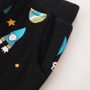 Kids black cotton sports pants with cartoon rocket print and elastic waistband