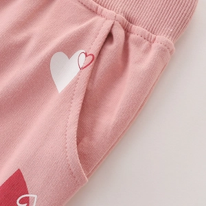 Pantalon de sport rose pour fille avec taille côtelée et motif cœur de poche