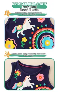 Dettaglio stampe unicorno e fiori su un abito estivo blu navy in cotone senza maniche