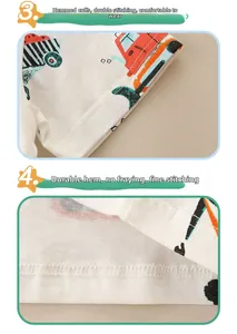 Detail view of double-stitched cuffs and hem on white cotton t-shirt with cartoon car print