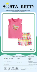 Detail of girls' 100% cotton pink sleeveless top with embroidery and plaid shorts