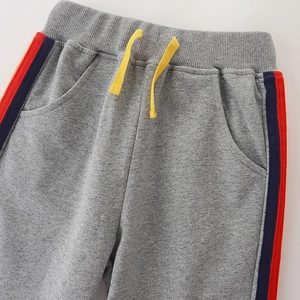 Kids grey cotton sweatpants with yellow drawstring and side stripes for boys