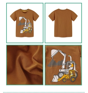 Detail view of cotton kids t-shirt with cartoon dinosaur excavator print on brown fabric