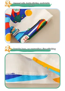 Detailed view of sleeve hem and bottom edge with precise double stitching and cartoon print