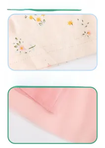 Detail shot of floral printed cotton sleeve and multi-layer pink tulle mesh skirt
