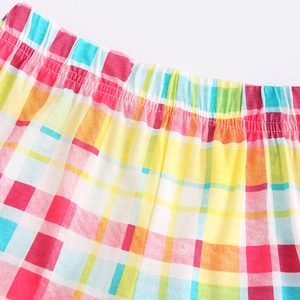 Girls' knitted rainbow plaid vest set featuring elastic waist detailing and soft cotton fabric