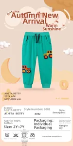 Close-up of 100% cotton light green toddler sweatpants with cute excavator embroidery