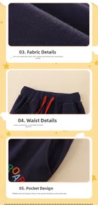 Detail of boys navy knit cotton pants with red drawstring waist and embroidered pocket