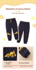 Detail of boys' navy joggers with yellow excavator embroidery and drawstring waistband