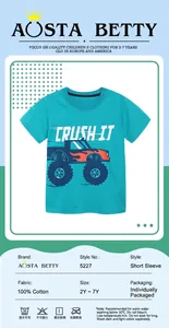 Detail showing 100% cotton blue boy's T-shirt with monster truck print and size labels